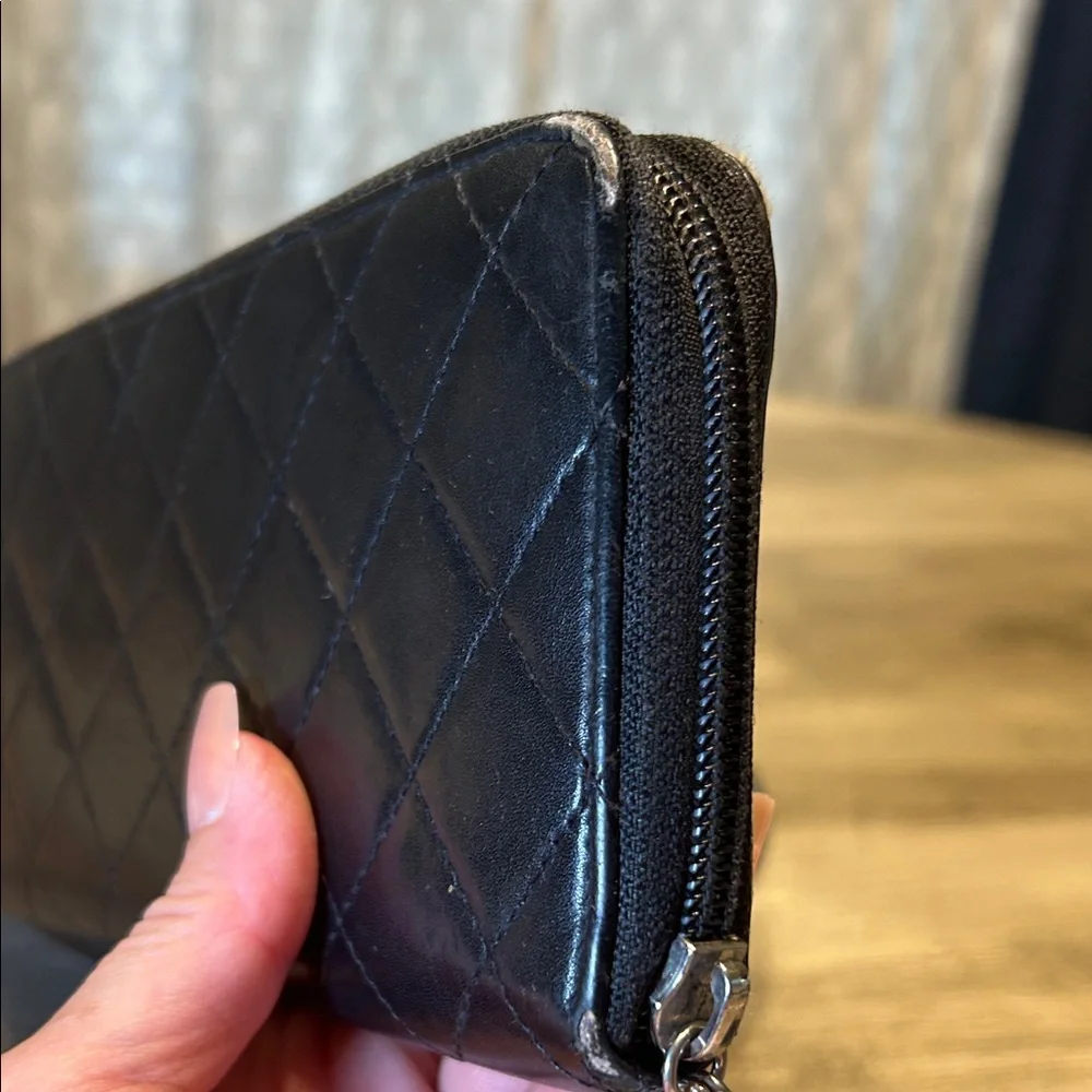 107. CHANEL Black Quilted Zipper Wallet-COA